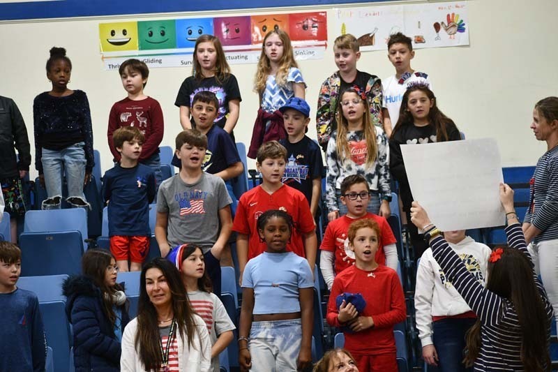 Blue Point Elementary celebrates Veterans Day with remembrance table